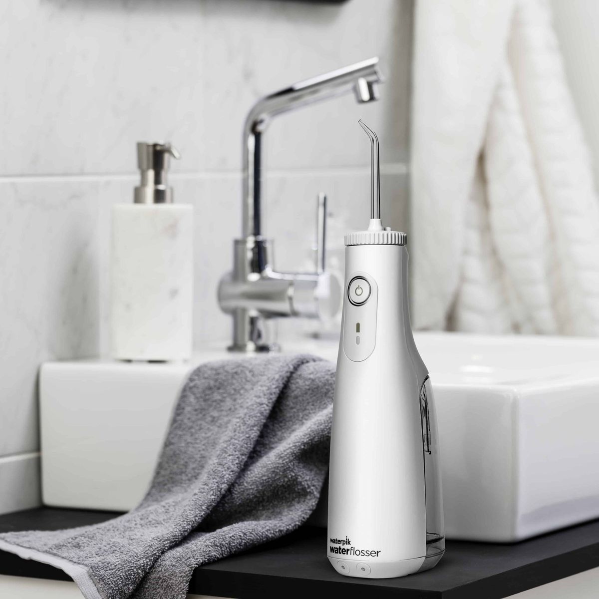 Bevielis burnos irigatorius Waterpik WF-10 Bevielis burnos irigatorius Waterpik WF-10